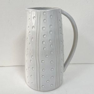 White Ceramic Pitcher with Textured Dot Pattern
